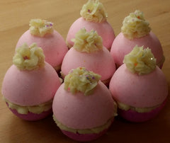 Piped cocoa butter bath bombs